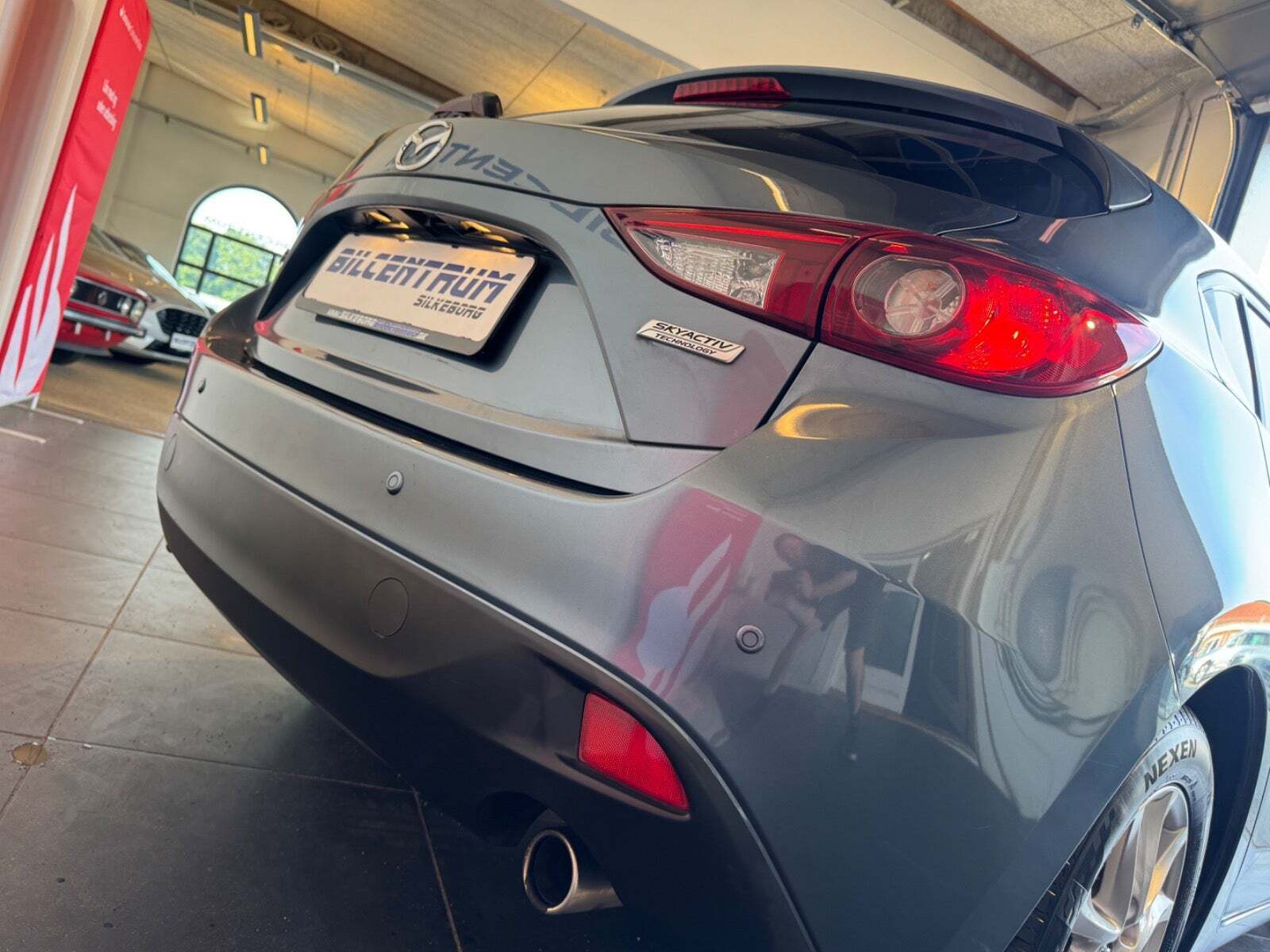 Blå Mazda 3 fra 2013