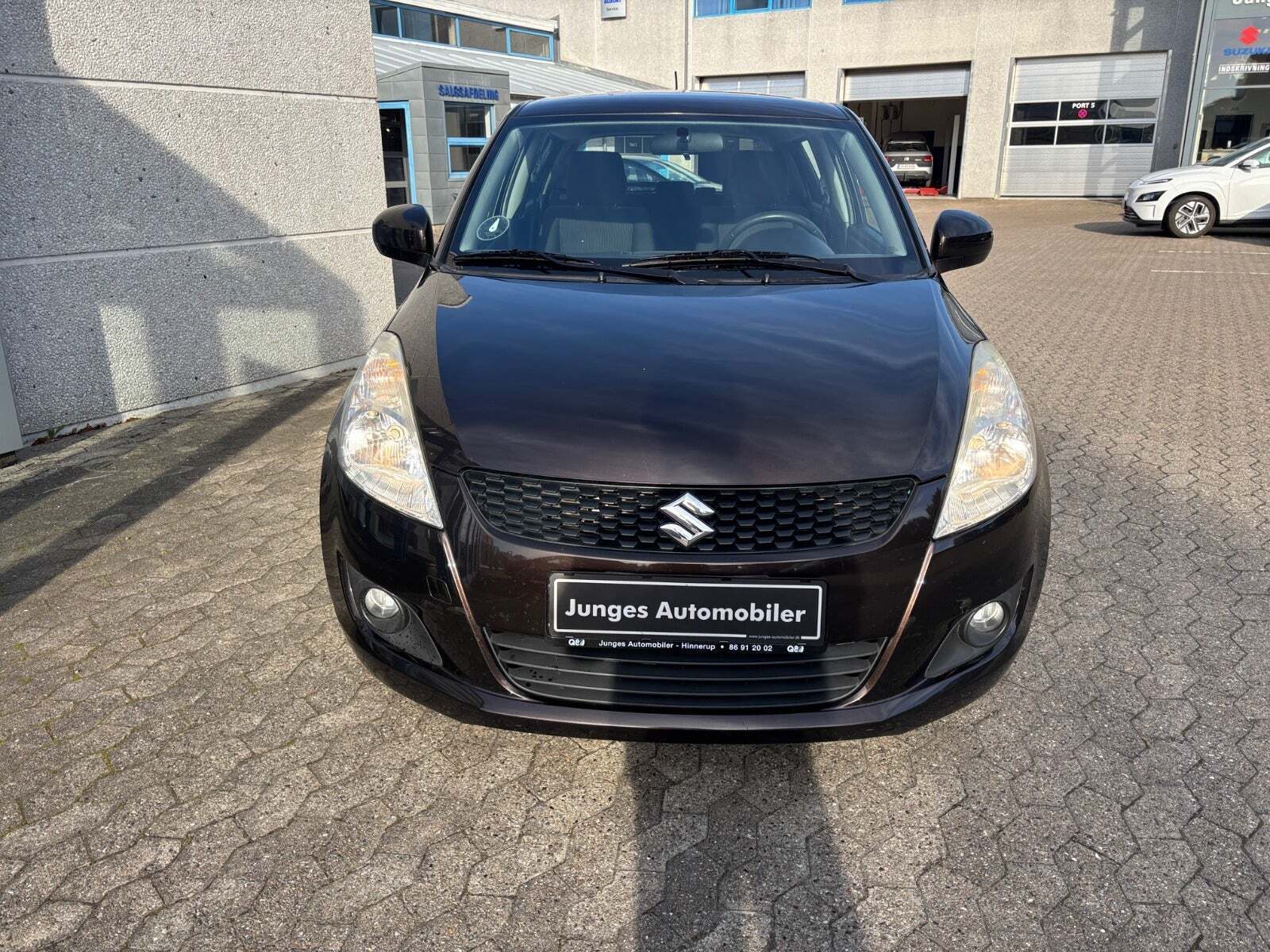 Brun Suzuki Swift fra 2013