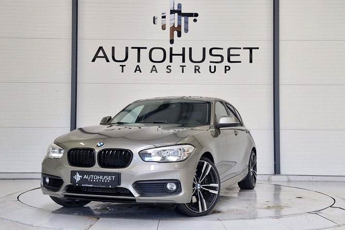 Brun BMW 118i fra 2016 set udefra