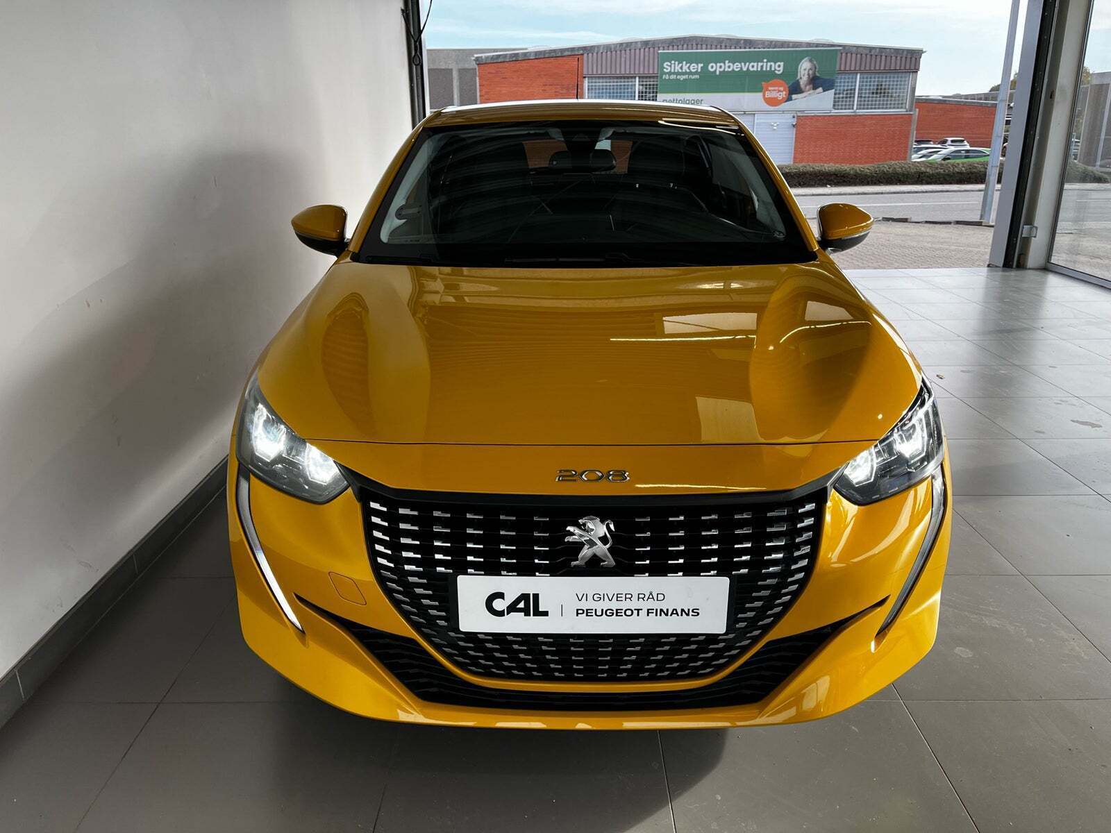 Gul Peugeot 208 fra 2021