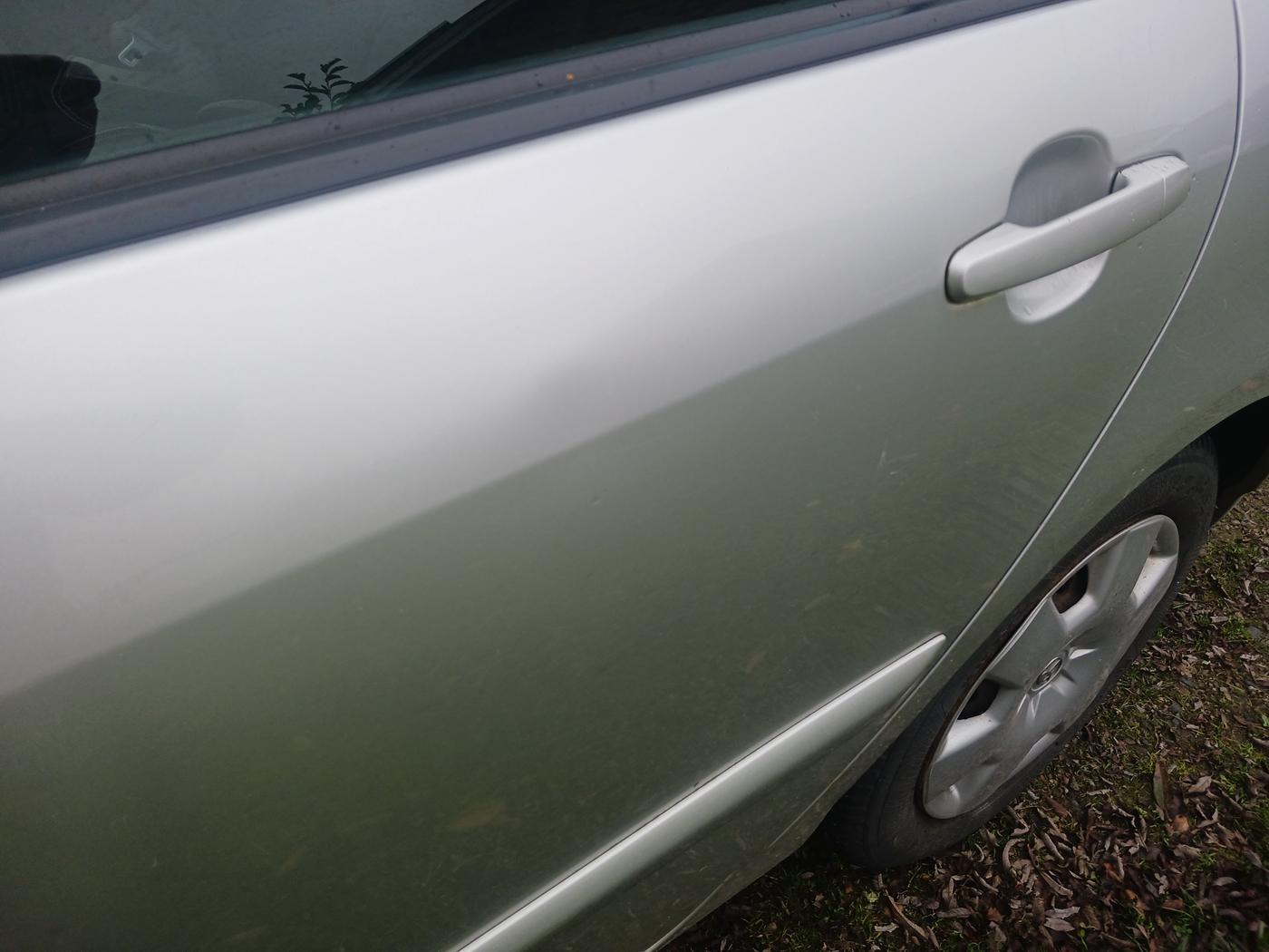 Grå Toyota Corolla fra 2006