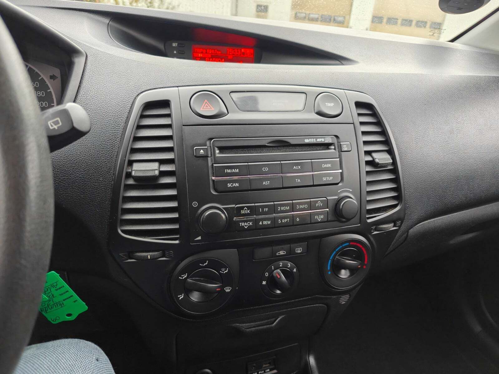 Gul Hyundai i20 fra 2009