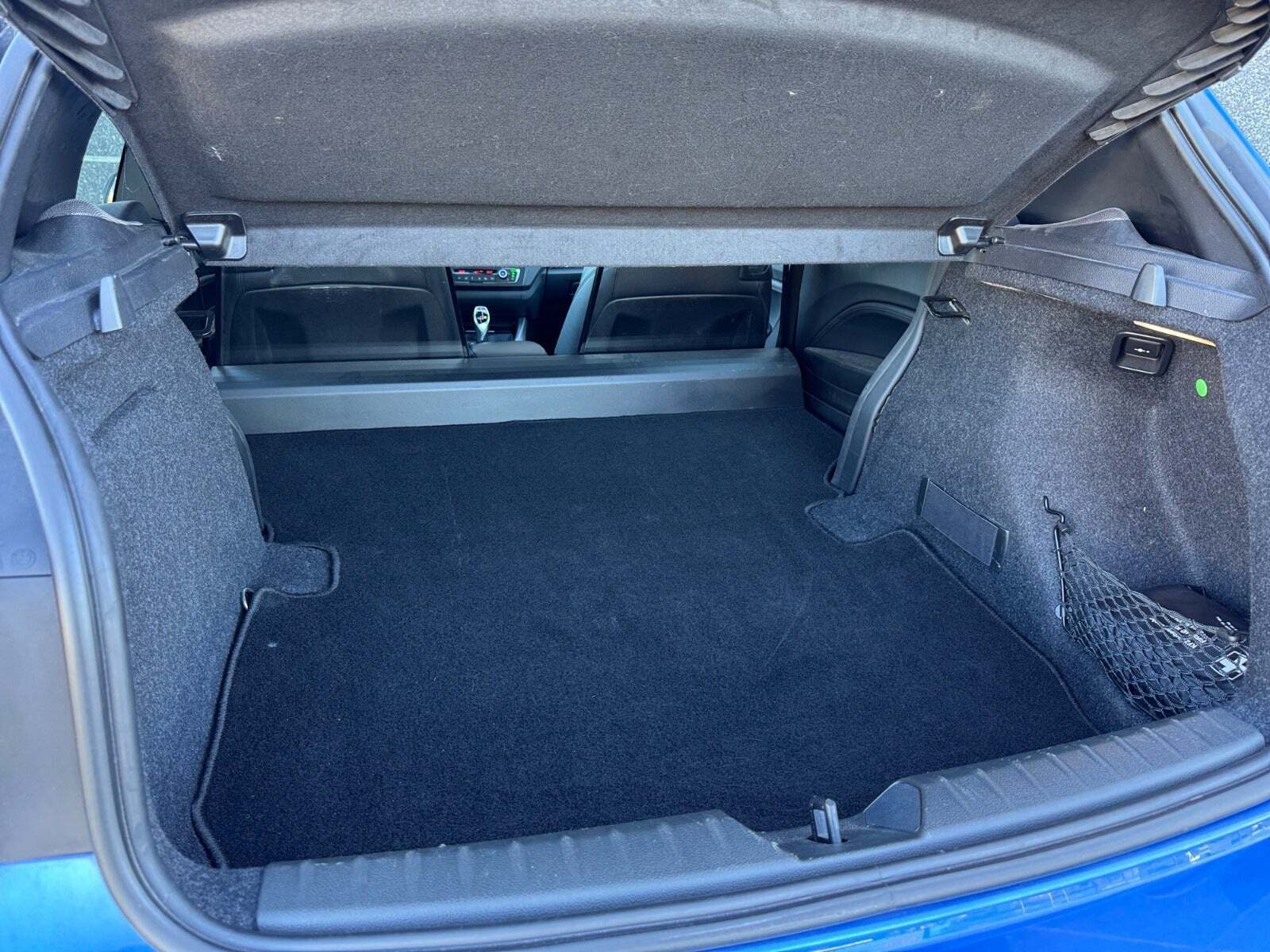 Blå BMW M135i fra 2013