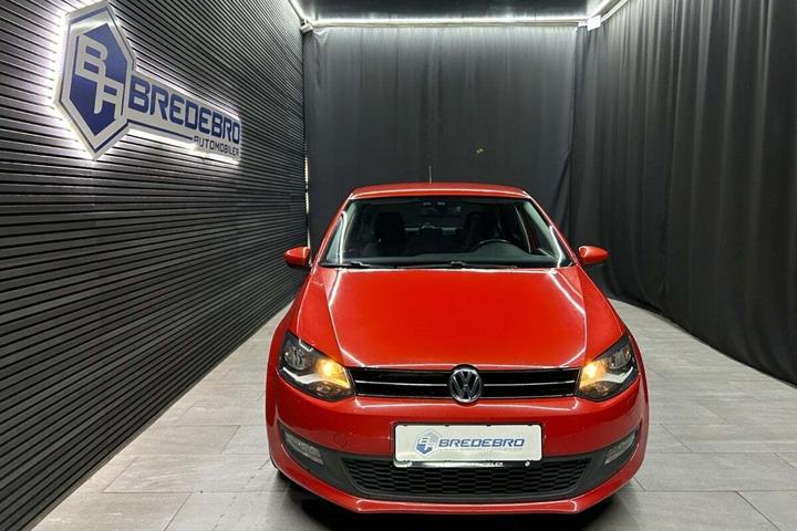 Orange VW Polo fra 2014