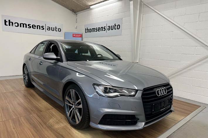 Grå Audi A6 fra 2016 set udefra