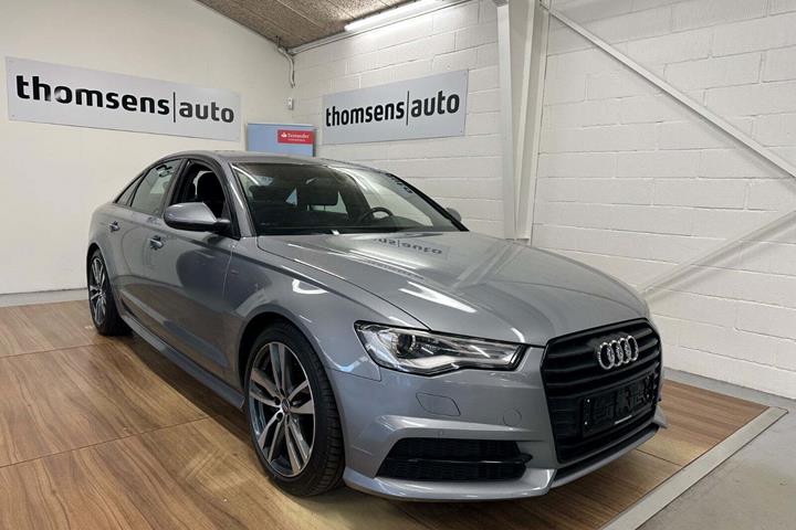 Grå Audi A6 fra 2016 set udefra