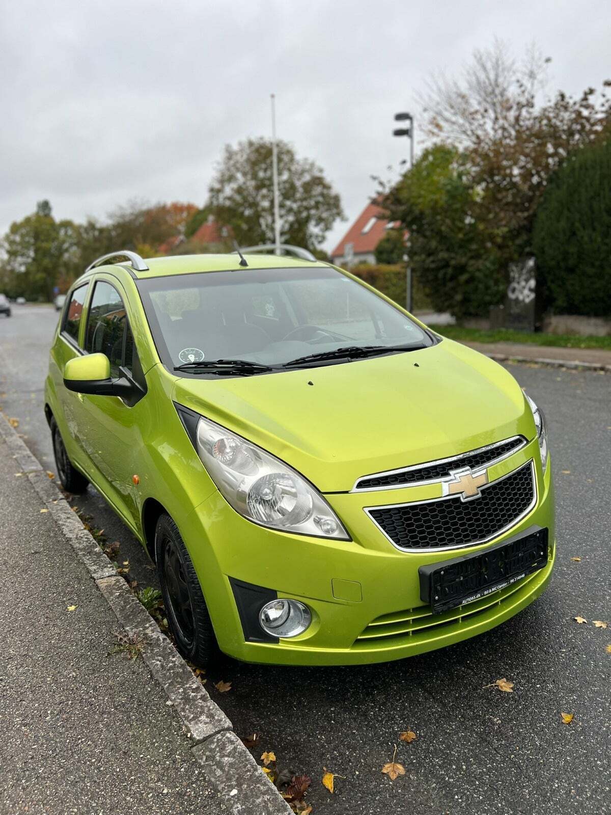 Grøn Chevrolet Spark fra 2012 set udefra