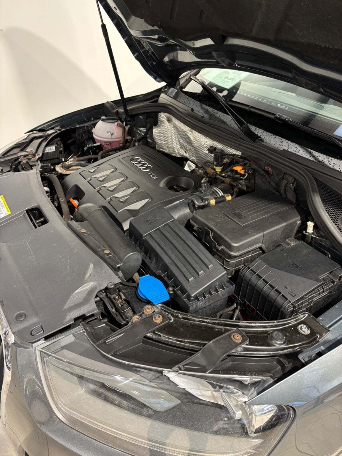 Grå Audi Q3 fra 2012