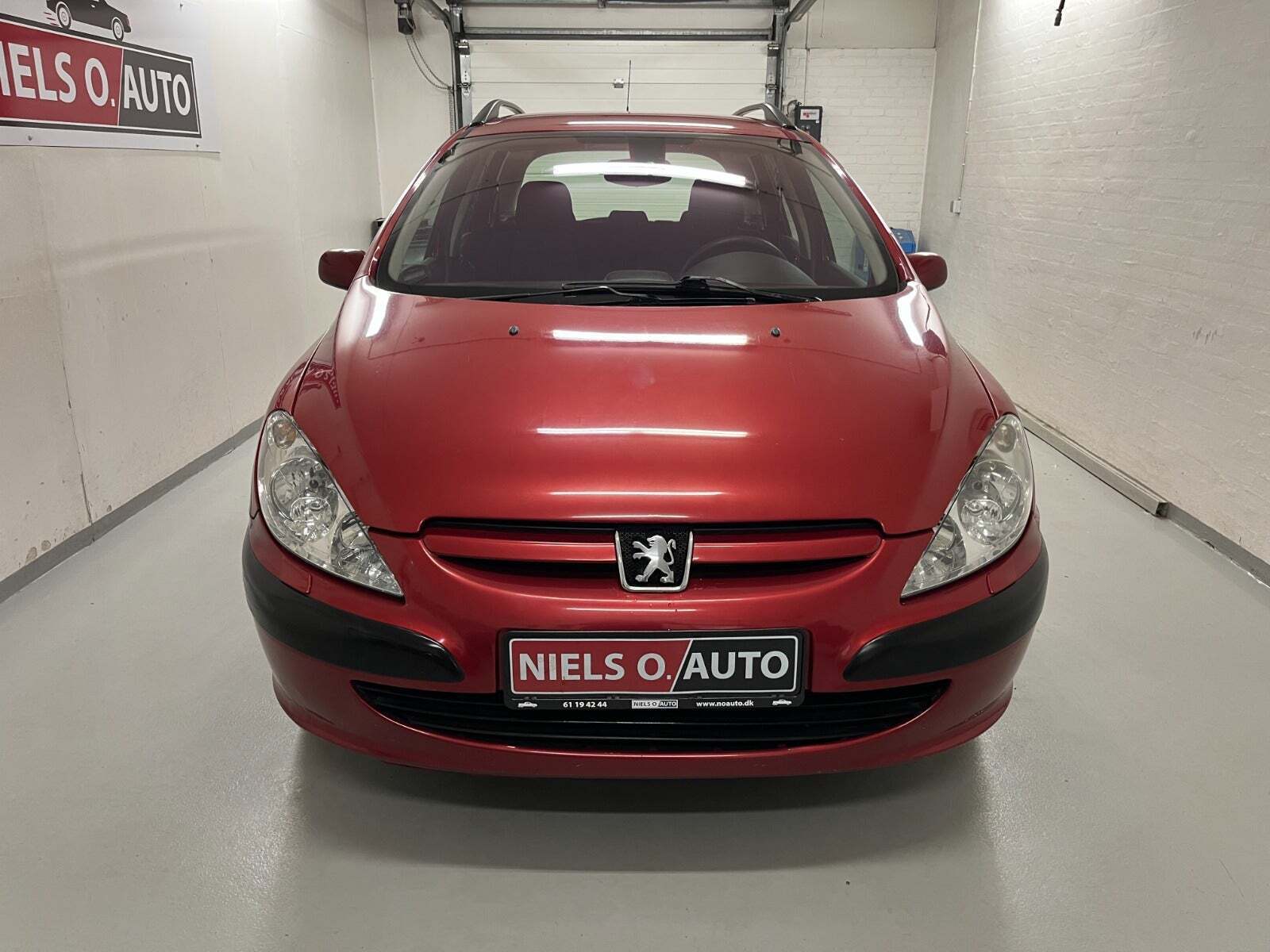 Rød Peugeot 307 fra 2003