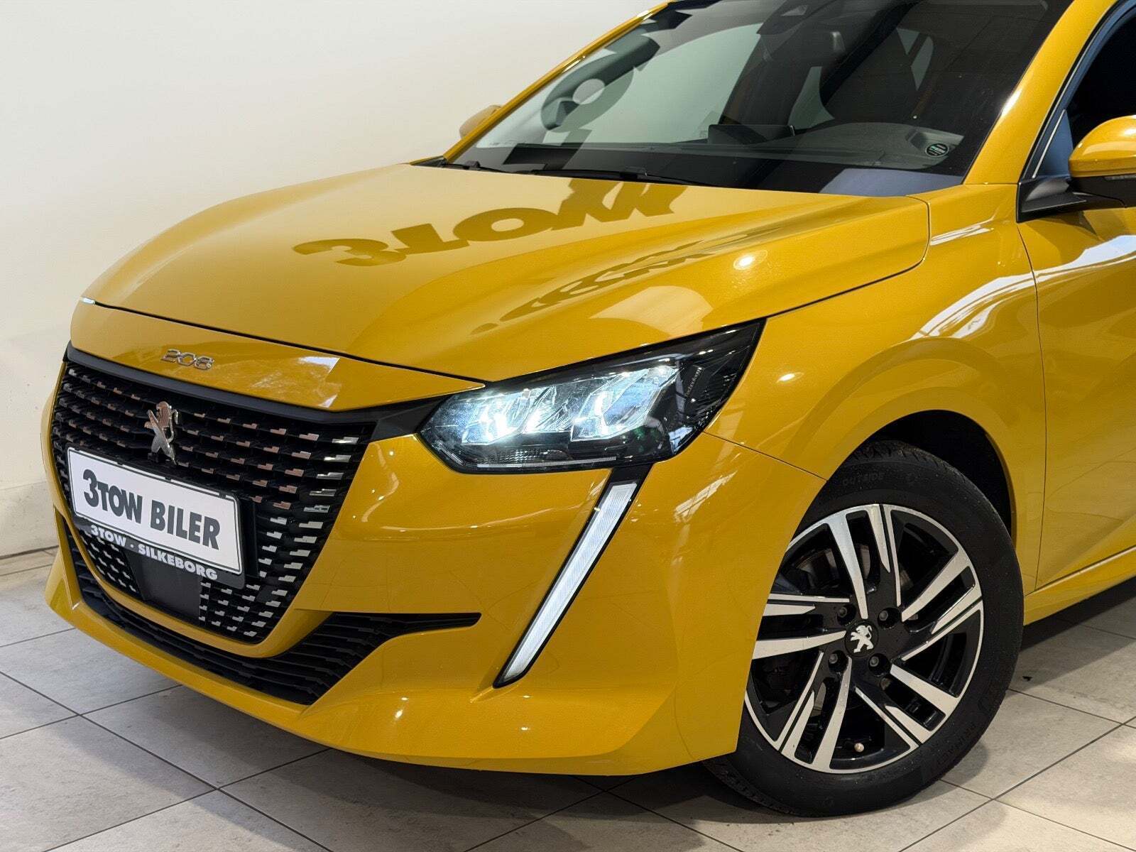 Gul Peugeot 208 fra 2020