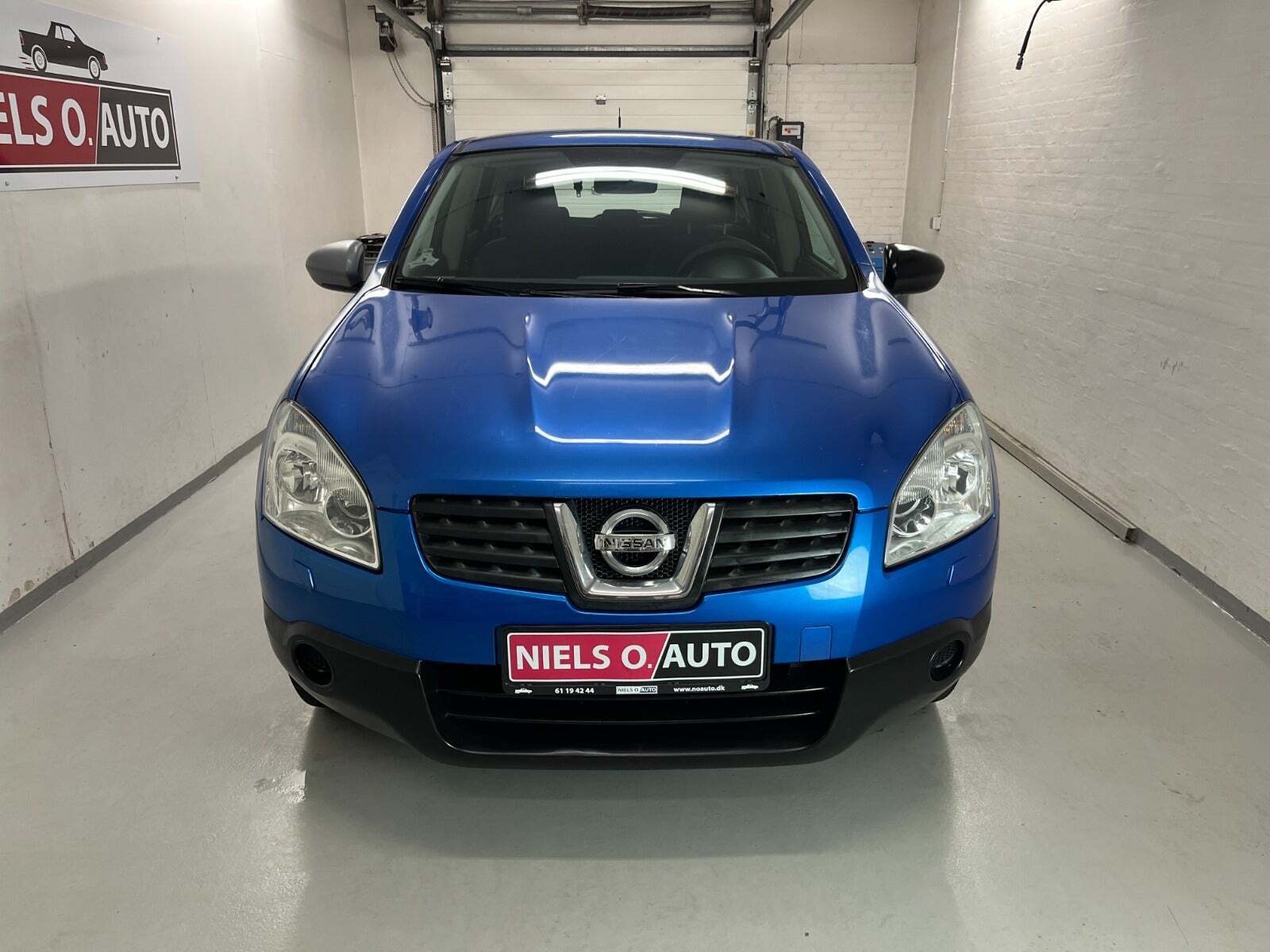 Blå Nissan Qashqai fra 2009
