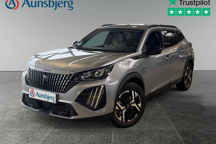 Grå Peugeot e-2008 fra 2023 set udefra