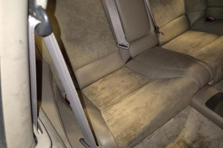 Grøn Volvo C70 fra 1998 set indefra