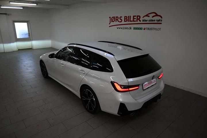 Hvid BMW 320e fra 2024
