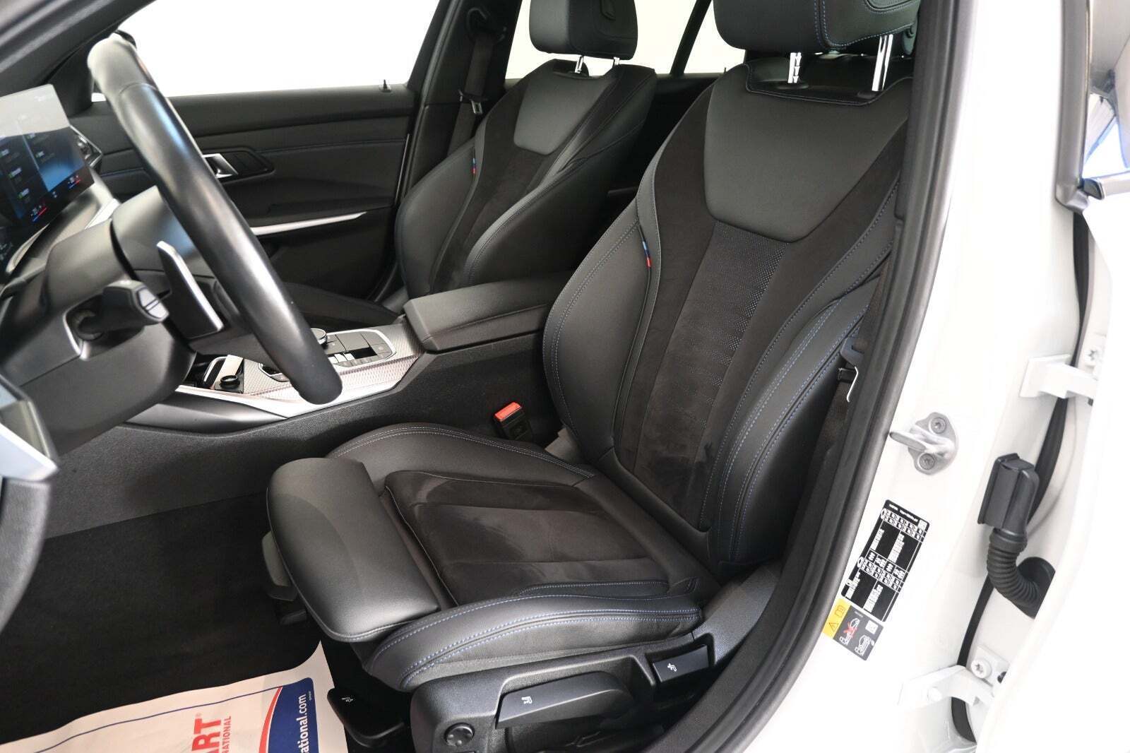 Hvid BMW 320e fra 2024