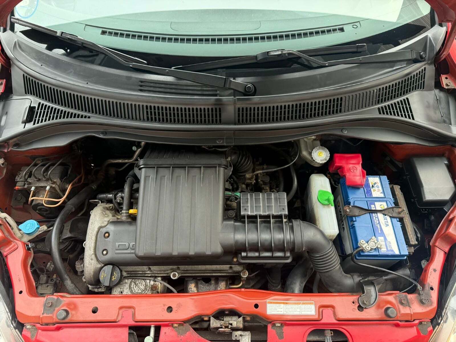 Rød Suzuki Swift fra 2007