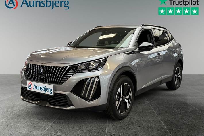 Grå Peugeot e-2008 fra 2023 set udefra