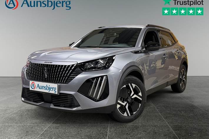 Grå Peugeot e-2008 fra 2023 set udefra