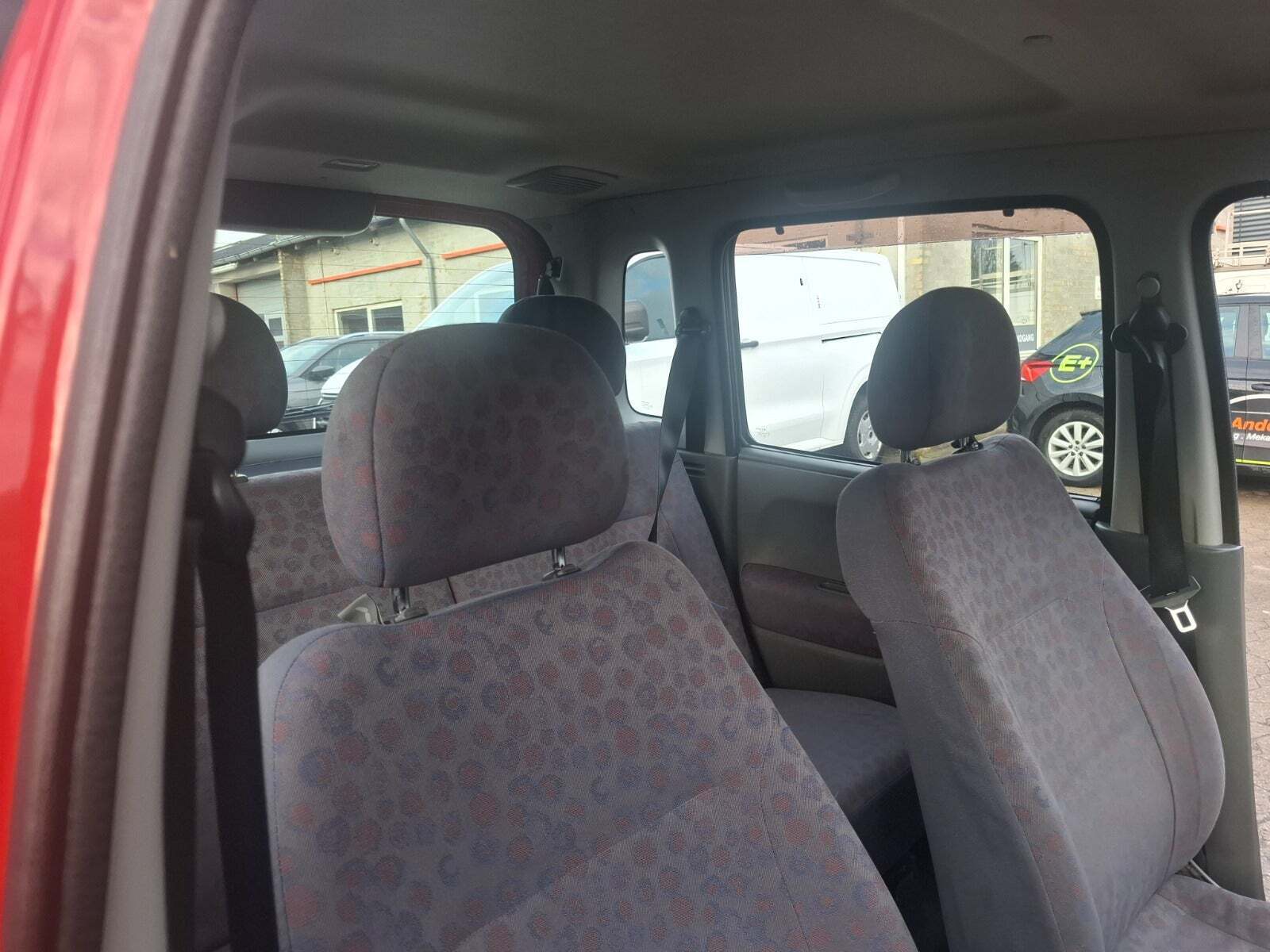 Rød Suzuki Wagon R+ fra 2002