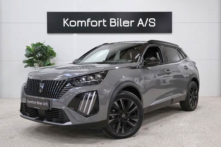 Grå Peugeot e-2008 fra 2024 set udefra