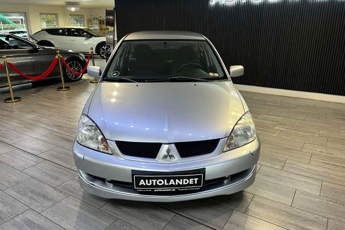 Sølv Mitsubishi Lancer fra 2008