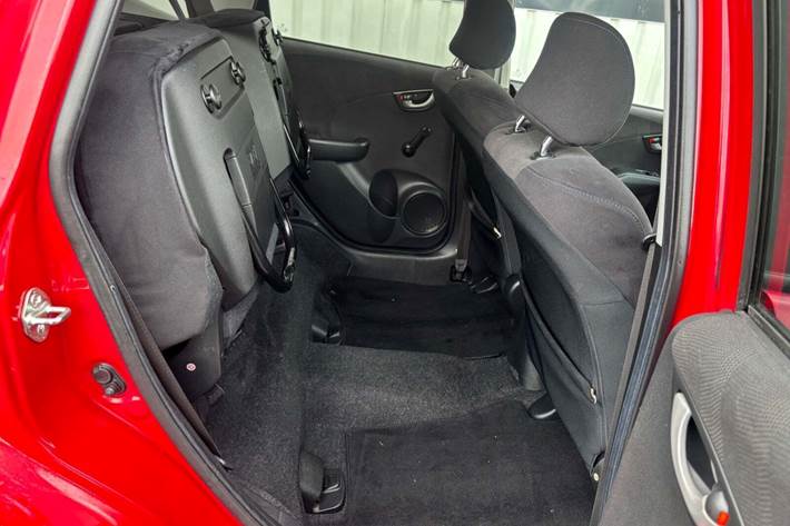 Rød Honda Jazz fra 2009