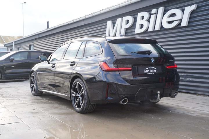 Sort BMW 320e fra 2023
