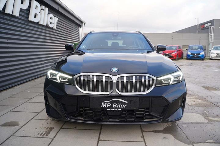 Sort BMW 320e fra 2023