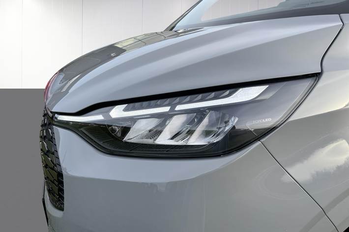 Grå Ford E-Transit Custom fra 2025 set udefra