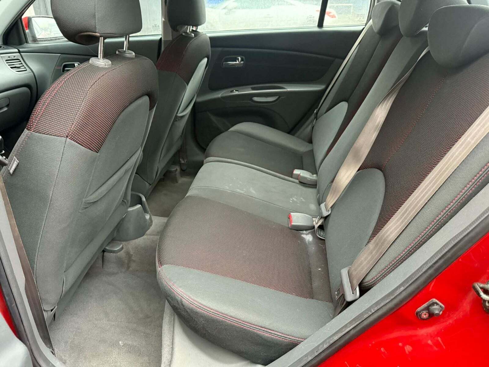 Orange Kia Rio fra 2006