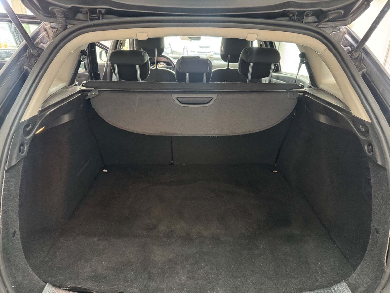 Blå Renault Megane III fra 2014