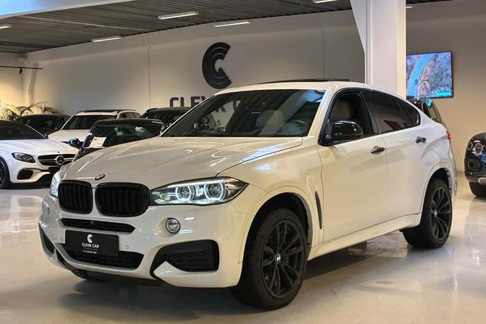 Grøn BMW X6 fra 2015 set udefra