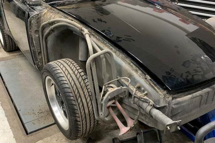 Blå Porsche 911 fra 1976 set udefra