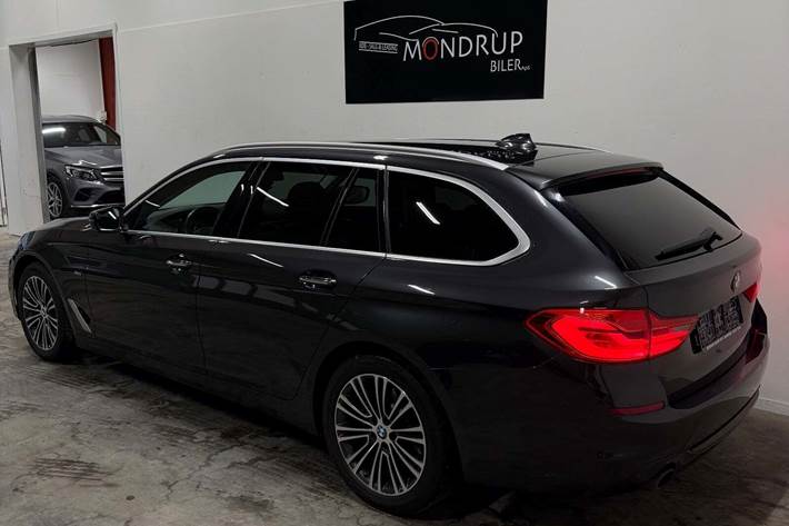 Grå BMW 520d fra 2018