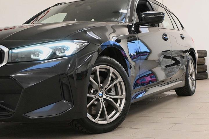 Sort BMW 320e fra 2023