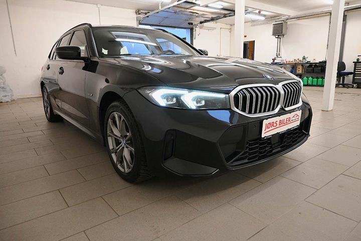 Sort BMW 320e fra 2023