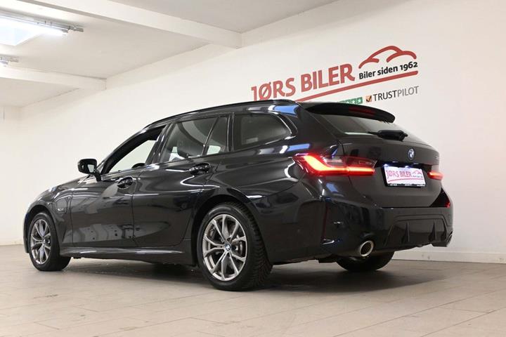 Sort BMW 320e fra 2023