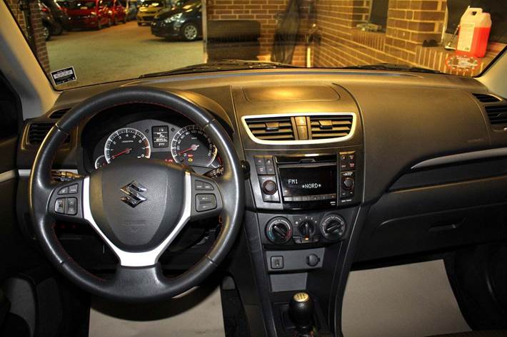 Brun Suzuki Swift fra 2012