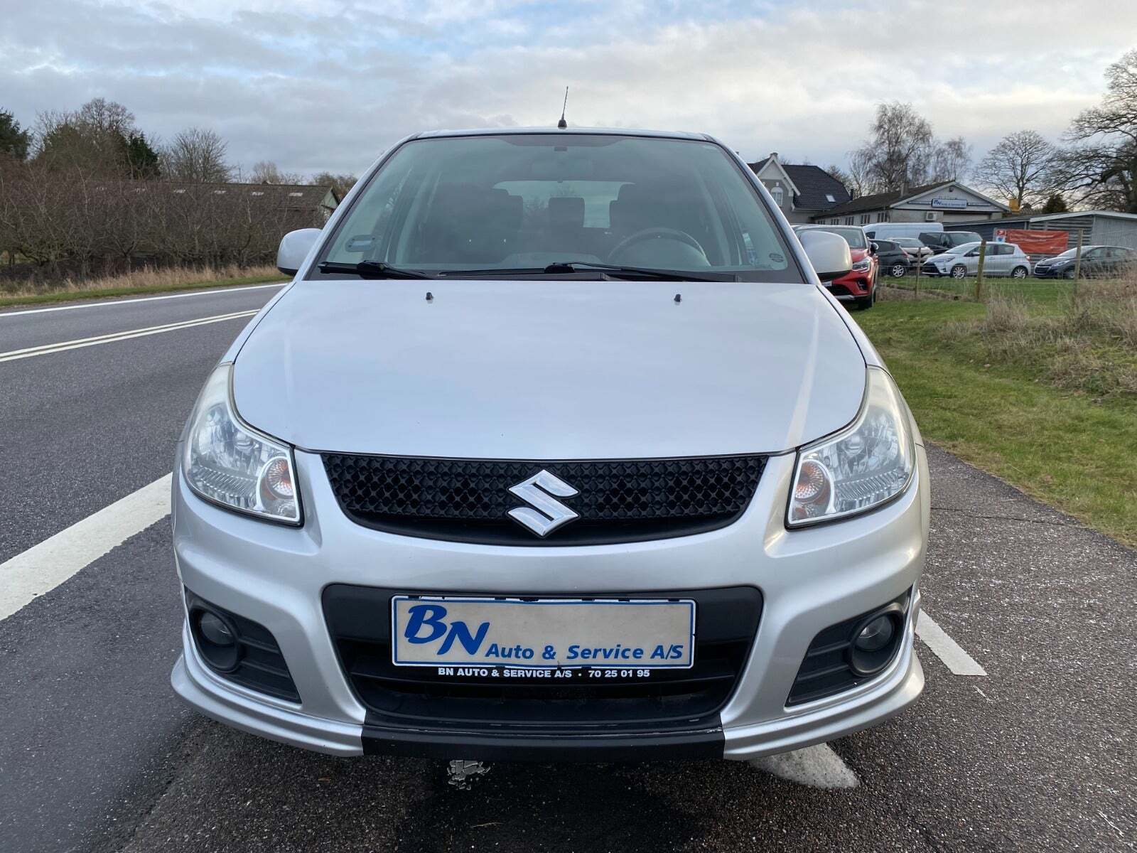 Sølv Suzuki SX4 fra 2012