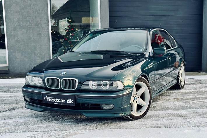 Grøn BMW 523i fra 1997 set udefra