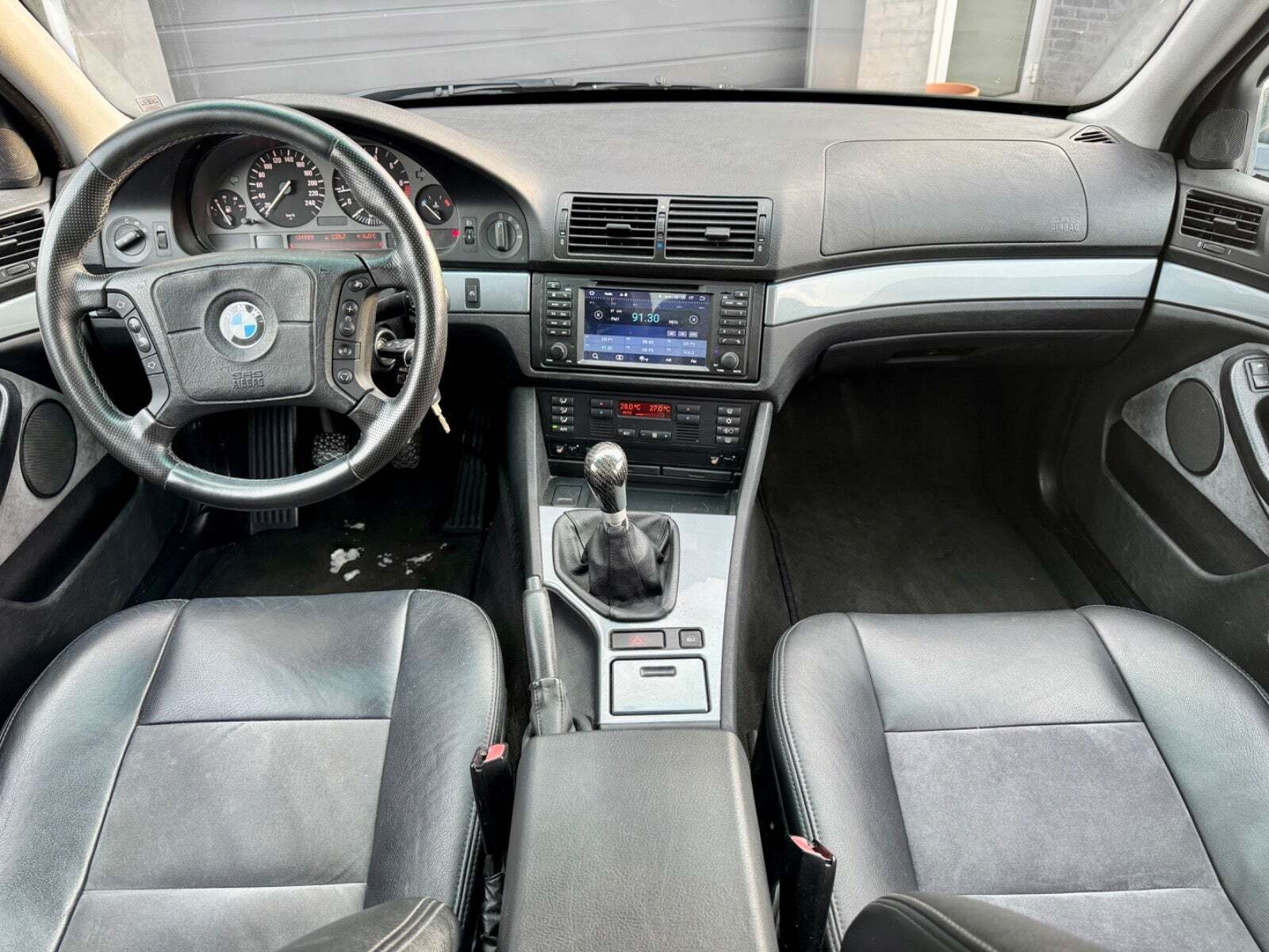 Grøn BMW 523i fra 1997