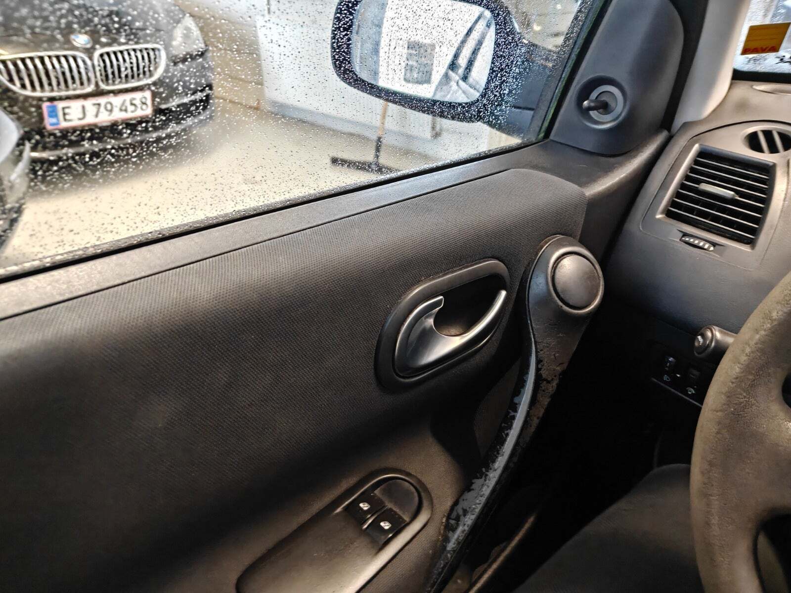 Gul Renault Megane II fra 2006