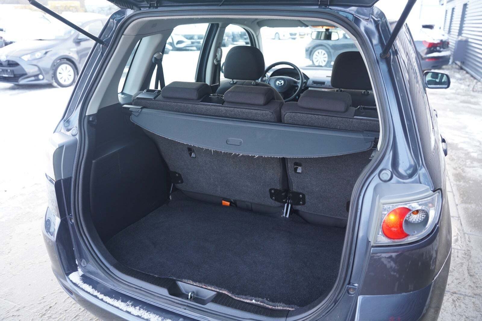 Grå Mazda 2 fra 2007