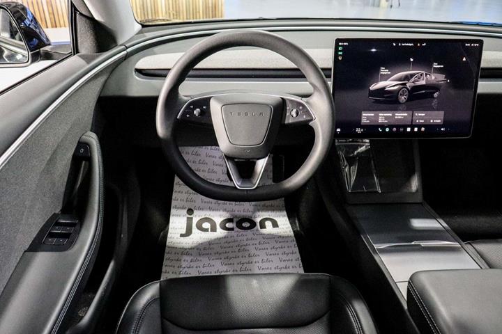 Sort Tesla Model 3 fra 2024
