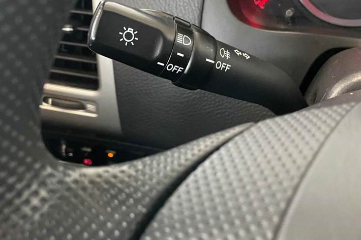 Orange Suzuki Liana fra 2008 set indefra