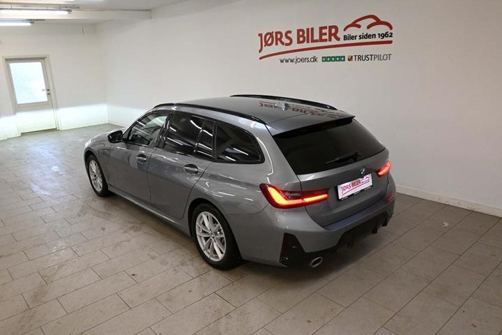 Grå BMW 320e fra 2023