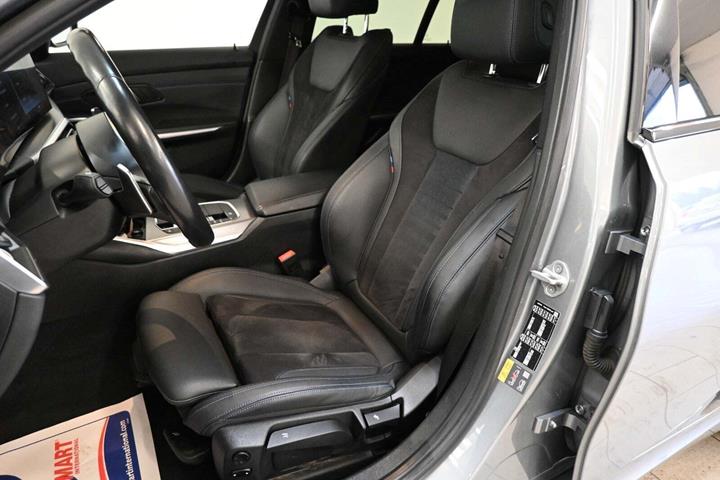 Grå BMW 320e fra 2023