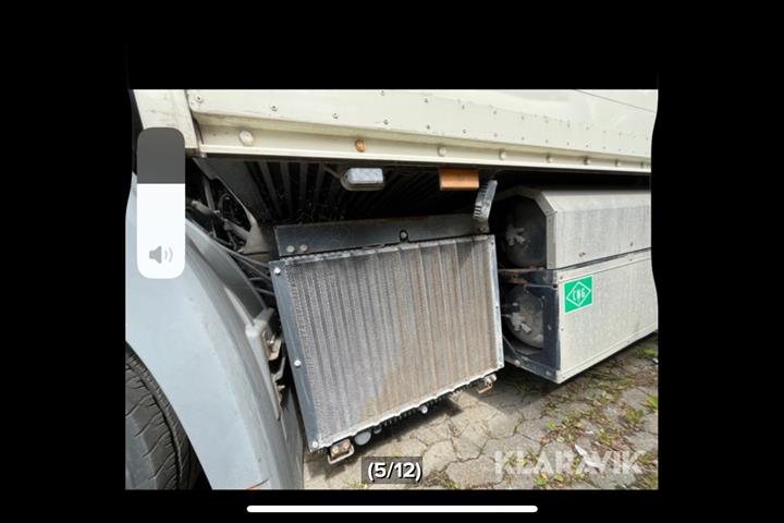 Beige Mercedes Econic 1830 fra 2016