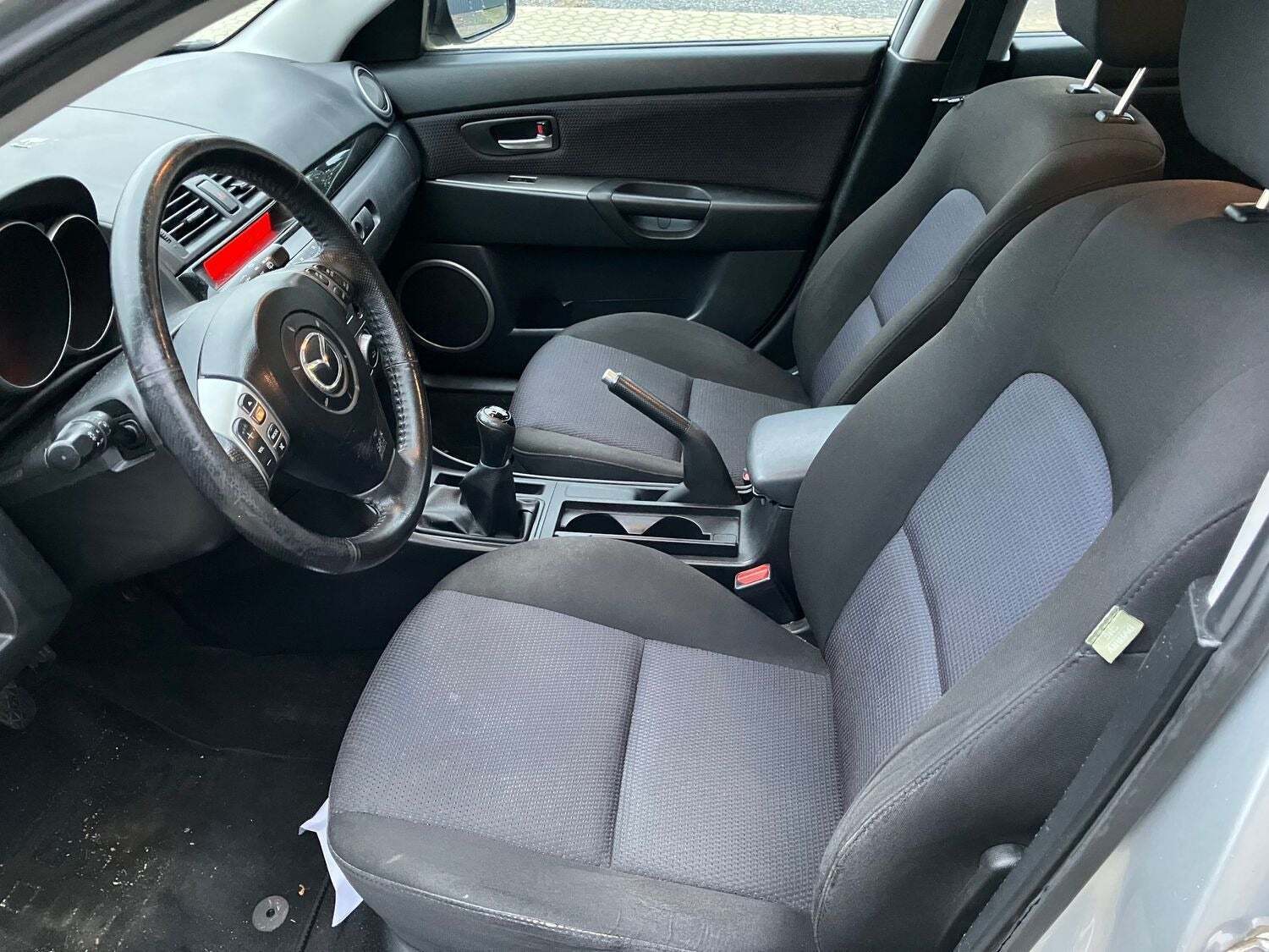Sølv Mazda 3 fra 2008