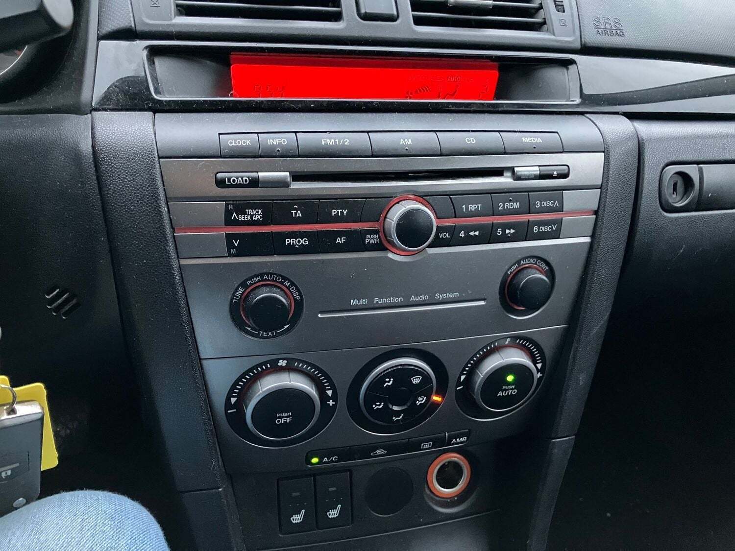 Sølv Mazda 3 fra 2008